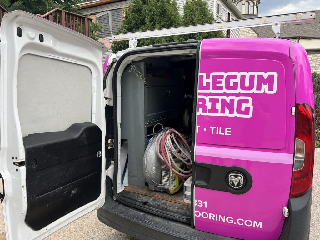 back view of Bubblegum Flooring van open